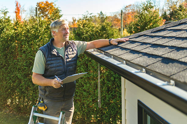 Professional Storm Damage Roof Repair technician working in Jackson, MI